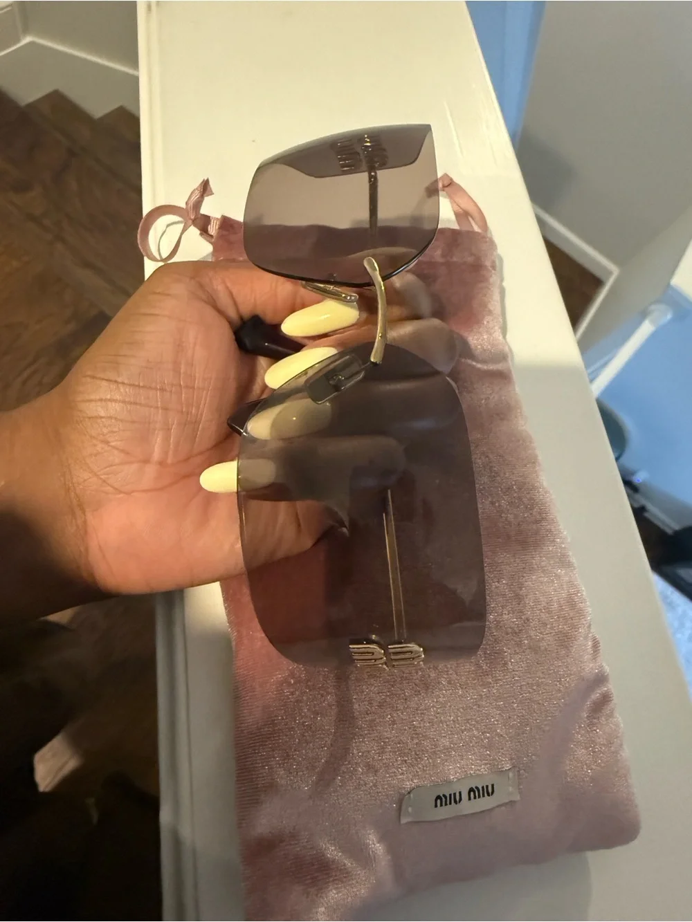Miu Miu Gold-Accented Pink Gradient Rimless Shield Sunglasses